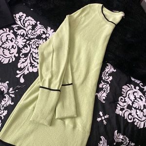 Pretty green and black pullover sweater.